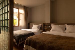 One Zen Lodge Snowy Haven客房内的一张或多张床位