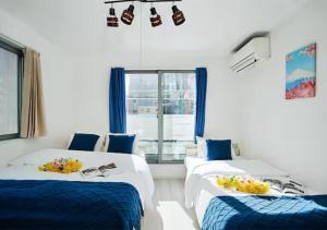 Postel nebo postele na pokoji v ubytování 4 minutes walk from Kawaguchi Newly built three-story single-family house with 78 square meters 18 minutes by train to Ueno