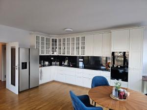 Kuchyň nebo kuchyňský kout v ubytování Vltava River Apartment
