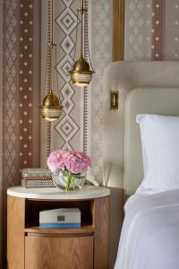 Postel nebo postele na pokoji v ubytování Mandarin Oriental, Muscat