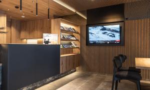 TV a/nebo společenská místnost v ubytování Hotel Lamtana