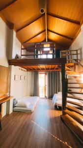 Postel nebo postele na pokoji v ubytování Sithaya Garden House @14