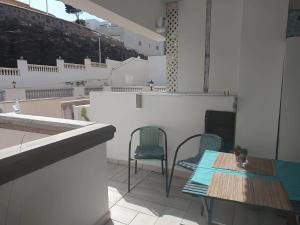Μια τηλεόραση ή/και κέντρο ψυχαγωγίας στο Comfortable apartment with sea view, La Estrella, 57 m²