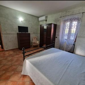Postel nebo postele na pokoji v ubytování Dimora D'Offizi