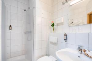 Koupelna v ubytování Best Western Blankenburg Hotel + 37 fotografií