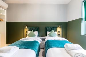 The Chapter Hotels - Finsbury Park客房内的一张或多张床位