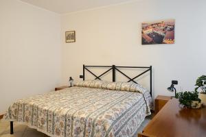 Ένα ή περισσότερα κρεβάτια σε δωμάτιο στο Suite Bergamo Centro-AC-Netflix