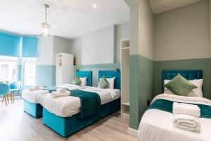 The Chapter Hotels - Finsbury Park客房内的一张或多张床位