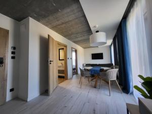 Posezení v ubytování USTROŃ RESIDENCE by VillaOlimpijska2