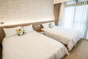 Letto o letti in una camera di 眺浪島民宿
