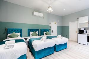 The Chapter Hotels - Finsbury Park客房内的一张或多张床位