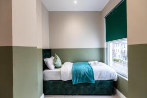 The Chapter Hotels - Finsbury Park客房内的一张或多张床位