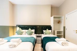 The Chapter Hotels - Finsbury Park客房内的一张或多张床位
