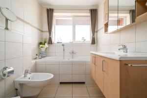 Ένα μπάνιο στο Appartement-Kapitaensdeck-415 +42 φωτογραφίες