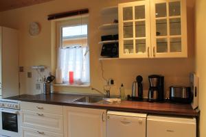 Køkken eller tekøkken på Ferienhaus Cottbus