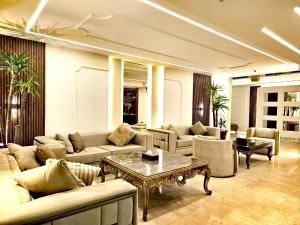 Posezení v ubytování Queens Suite Hotel