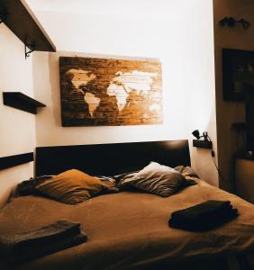 a bed with two pillows on it in a bedroom at la Casetta nel Borgo antico in Corese Terra