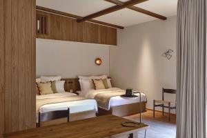 Postel nebo postele na pokoji v ubytování HACIENDA VISON hotel