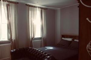 A bed or beds in a room at B&B San Paolo Sweethome
