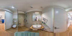 a bathroom with a sink and a shower at Villa Klara in Vodice +88 photos
