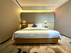 珠海市にあるZhuhai New Aolin Apartment - Tangjiawan Stationのギャラリーの写真