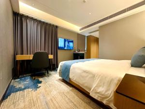 珠海市にあるZhuhai New Aolin Apartment - Tangjiawan Stationのギャラリーの写真