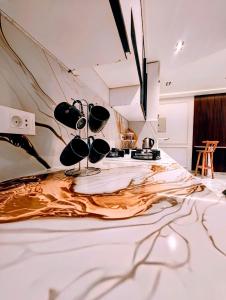 a room with a table with glasses on it at Luxury Furnished Condo in Egypt in Cairo