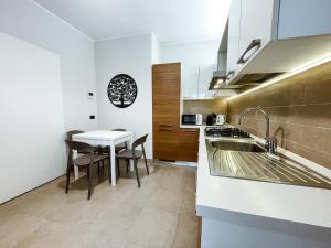 Kuchyň nebo kuchyňský kout v ubytování La Casa del Viaggiatore, Gaggiano + 16 fotografií