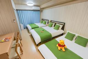 Postel nebo postele na pokoji v ubytování Room 204 Nishi-Shinjuku Gochome 9 minutes walk 40 square meters Sleeps up to 6 people