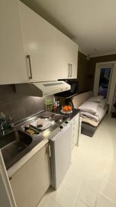 Kuchyň nebo kuchyňský kout v ubytování Bright and cosy dorm + 2 fotografie