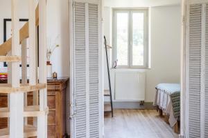 Postel nebo postele na pokoji v ubytování Zero Neuf