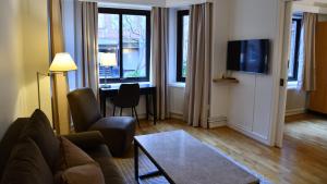 Sjónvarps- og/eða afþreyingartæki á Home Hotel Norre Park