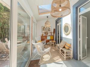 Posezení v ubytování maison de l'arbousier