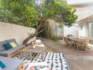 Posezení v ubytování maison de l'arbousier