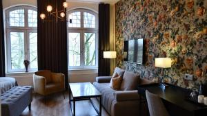 TV a/nebo společenská místnost v ubytování Home Hotel Norre Park
