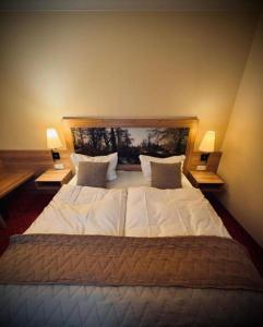 Ένα ή περισσότερα κρεβάτια σε δωμάτιο στο Gasthaus & Hotel Zum Kellermann