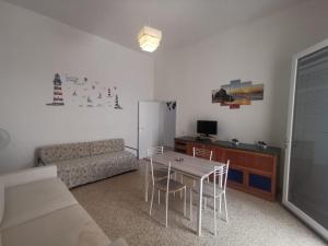 TV a/nebo společenská místnost v ubytování Villetta Vivaldi 2