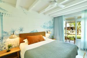 Кровать или кровати в номере Veranda Grand Baie Hotel & Spa +37 фотографий