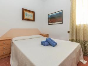 Posteľ alebo postele v izbe v ubytovaní Apartment Edificio Garcomar I by Interhome