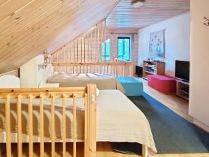 En eller flere senge i et værelse på Holiday Home Kultakoto a by Interhome + 20 billeder