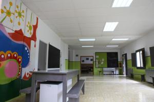 TV a/nebo společenská místnost v ubytování Casa de Colònies Vall de Boí - Verge Blanca