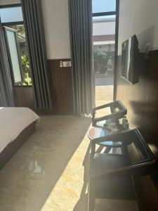 Posezení v ubytování Nam Anh Hotel
