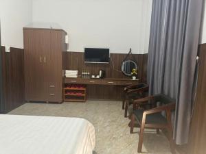 TV a/nebo společenská místnost v ubytování Nam Anh Hotel