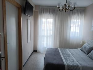 Posteľ alebo postele v izbe v ubytovaní Albergue Agarimo