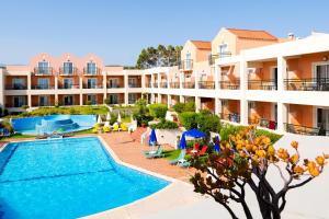 an image of a resort with a swimming pool at Pegasus Hotel in Stalos