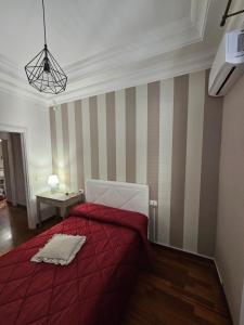 A bed or beds in a room at MeliKris home