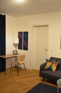 Et opholdsområde på MSF Apartment Blauer Wolf + 10 billeder