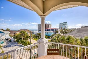 a balcony with a view of the beach and buildings at Oceanview Family & Pet-Friendly Escape, 300 Steps to Beach, 2608H in New Smyrna Beach