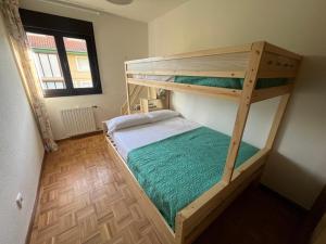 En eller flere senge i et værelse på La Fragüa de Solatorre