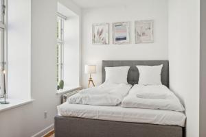 Ένα ή περισσότερα κρεβάτια σε δωμάτιο στο Modern City Suite in the old centre